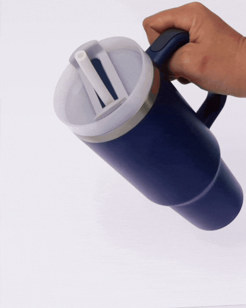 GIF showing the FlavaFil straw being used in a Stanley-style tumbler while filtering and flavoring water.